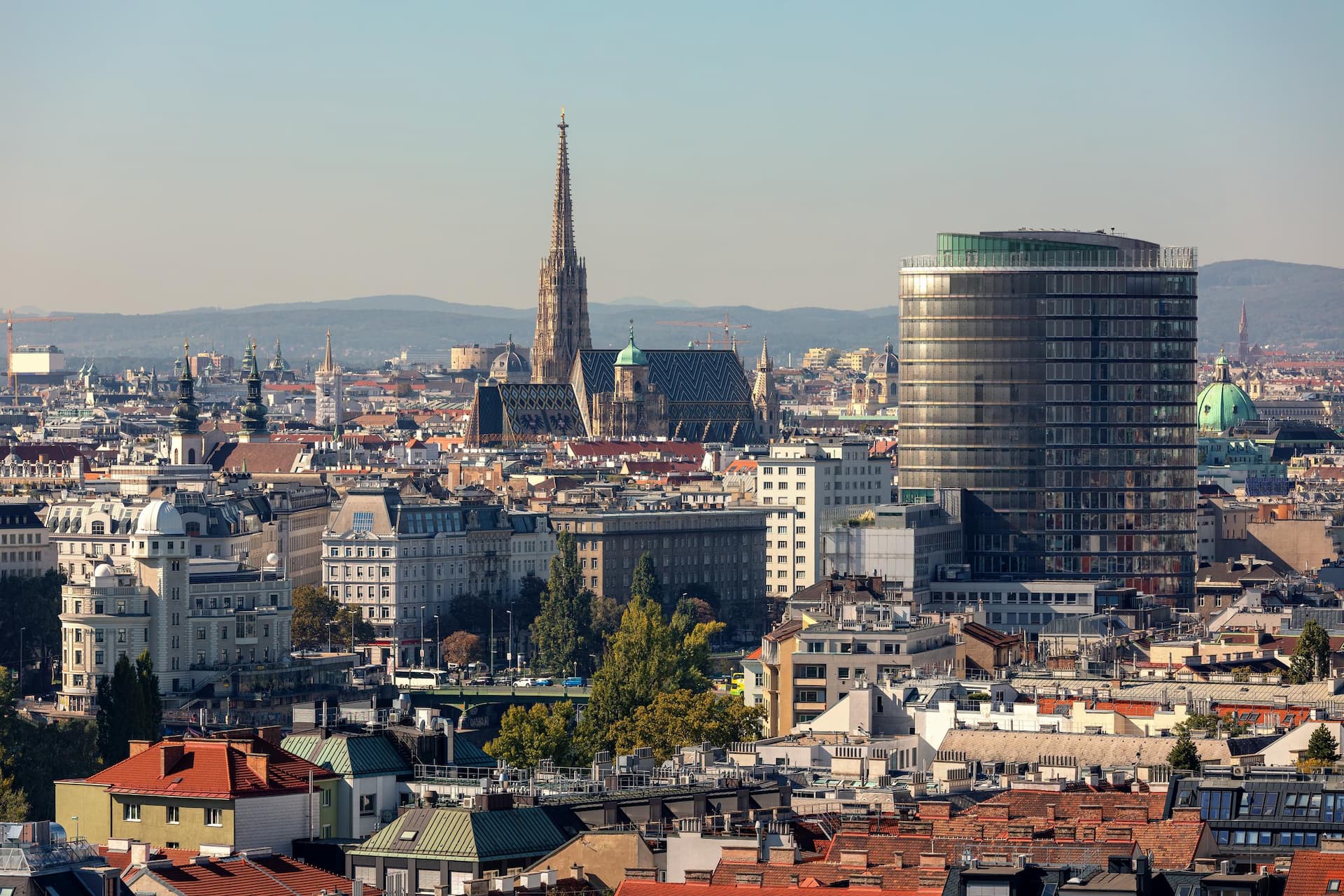 Aerial view of buildings and St. Stephen's Cathedral on background in historic part of Vienna, Austria.